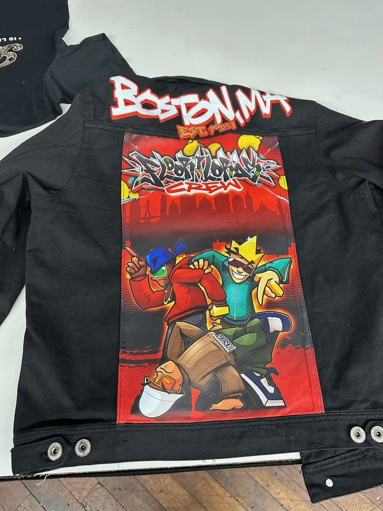 Finished black jacket with full color custom DTF back print by 2 EZ Printing